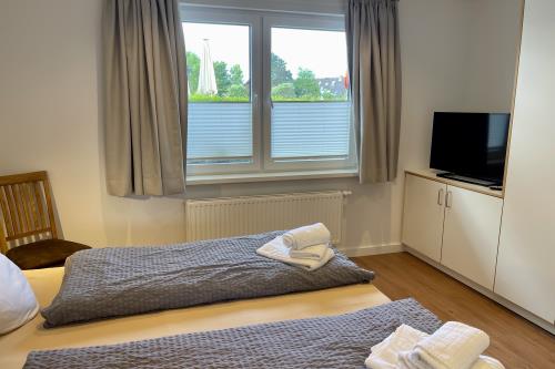 Langeoog Ferienwohnung Haus Döring - Schlafzimmer 1