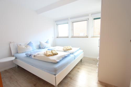 Langeoog Ferienhaus Us Langeoog - Kapteinshus - Brigg - OG - Ausstattung 4