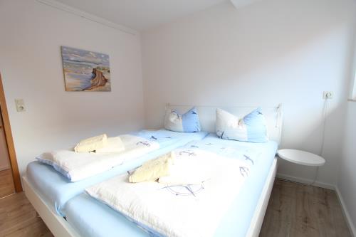 Langeoog Ferienhaus Us Langeoog - Kapteinshus - Brigg - OG - Ausstattung 5