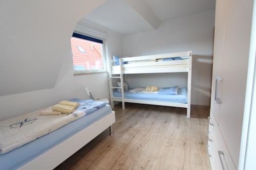 Langeoog Ferienhaus Us Langeoog - Kapteinshus - Brigg - OG - Ausstattung 6