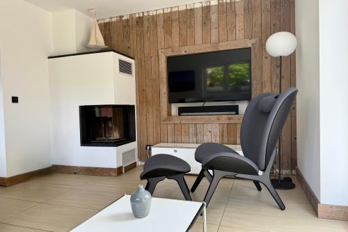 Langeoog Ferienhaus Meerleben - Wohnzimmer / Kamin