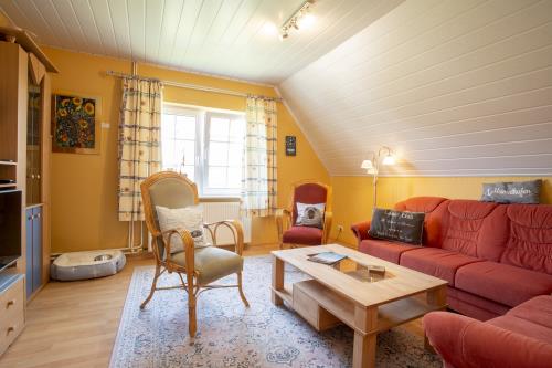 Langeoog Ferienwohnung Das Künstlerhaus - Malkasten OG - Wohnzimmer