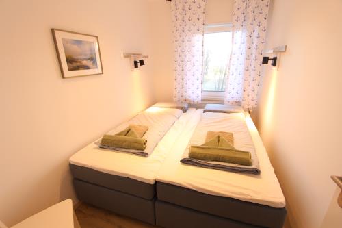 Langeoog Ferienwohnung Us Langeoog - Strandliebe - EG - Ausstattung 6