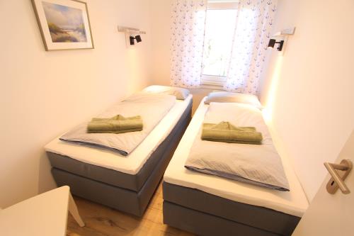 Langeoog Ferienwohnung Us Langeoog - Strandliebe - EG - Ausstattung 7