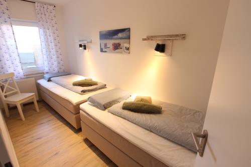 Langeoog Ferienwohnung Us Langeoog - Strandliebe - EG - Ausstattung 8