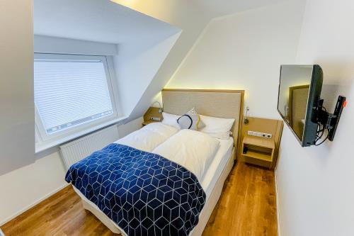 Langeoog Ferienwohnungen Friesenschiff - Flet Fjouwer - Schlafzimmer