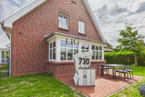 Langeoog Ferienwohnung Haus Norderloog - Captain Carlson - CAM04236G0 PR0050 STILL019