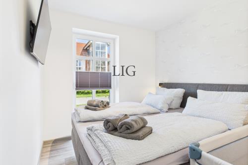 Langeoog Ferienwohnung Haus Norderloog - Captain Carlson - CAM04236G0 PR0050 STILL007