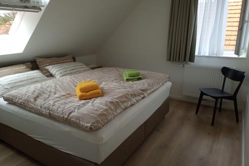 Langeoog Ferienhaus Große Freiheit Langeoog ***** - West - Schlafzimmer