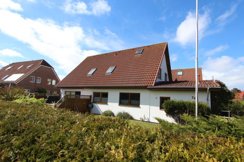 Langeoog Ferienwohnung Us Langeoog - Haus am Wald