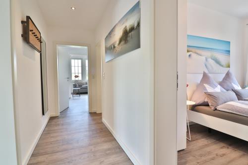 Langeoog Ferienwohnung Vermietung am Meer – Haus Dünenblume - Haus Dünenblume - Wohnung 1 - Flur