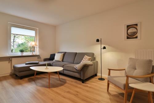 Langeoog Ferienwohnung Vermietung am Meer – Haus Seedüvel - Seedüvel EG - Wohnzimmer