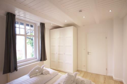 Langeoog Ferienwohnung meer Langeoog - oog een - Schlafzimmer