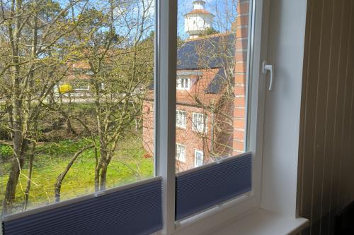 Langeoog Ferienwohnung Wind & Meer - Aussicht auf den Wasserturm