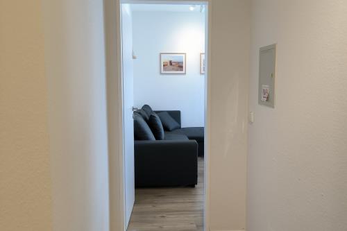 Langeoog Ferienwohnung Wind & Meer - Flur zum Wohnzimmer